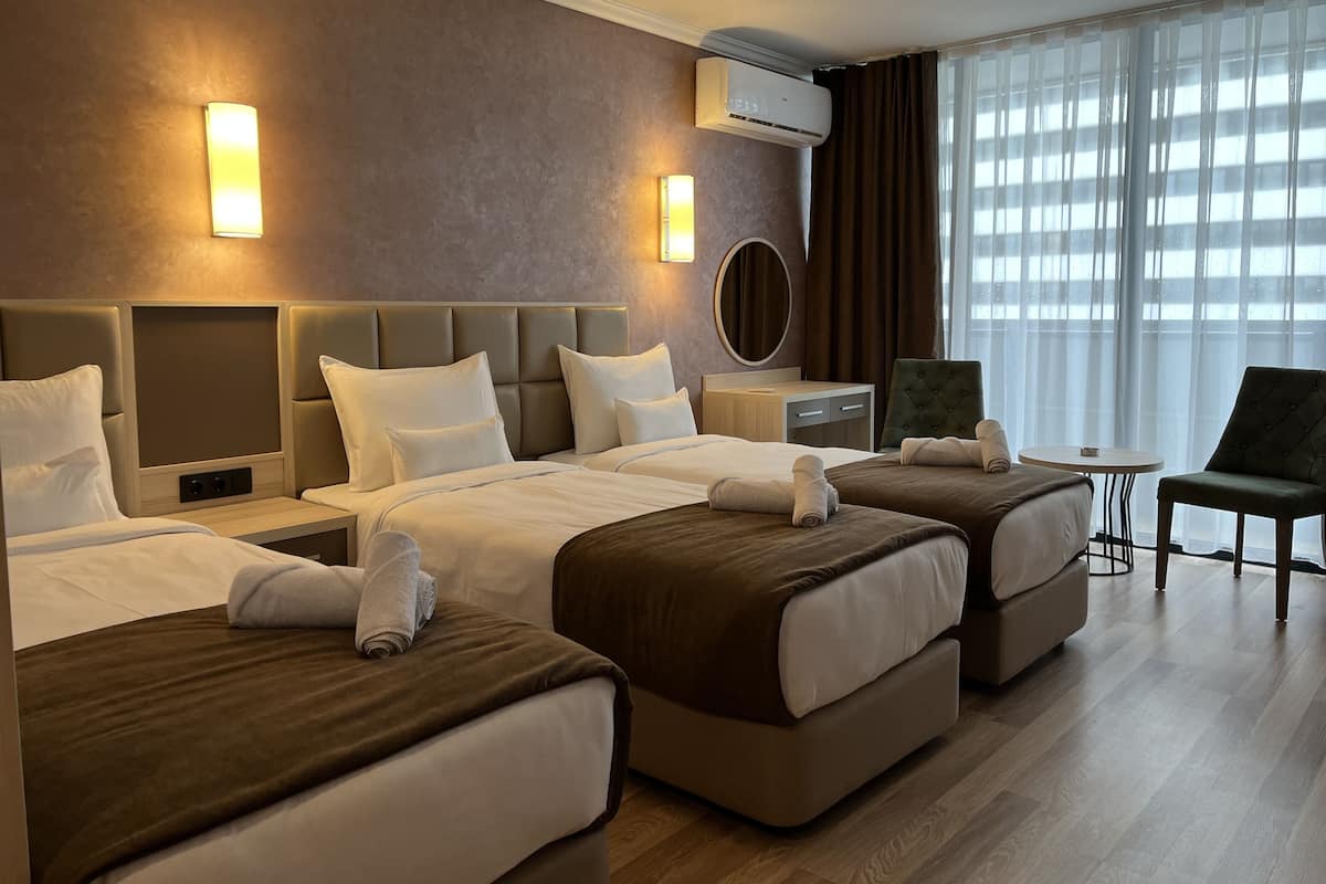 Standard Triple Room | Hypo-allergenic bedding available, minibar, desk, laptop workspace