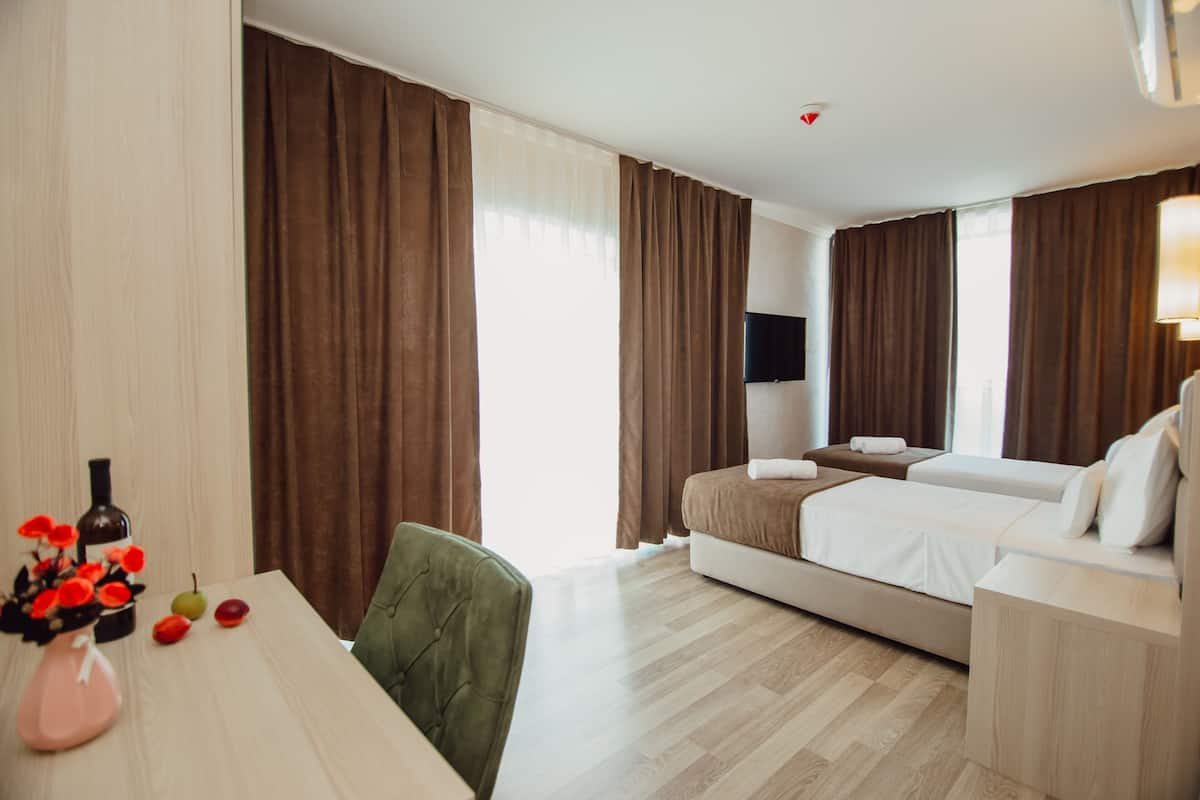 Luxury Room | Hypo-allergenic bedding available, minibar, desk, laptop workspace