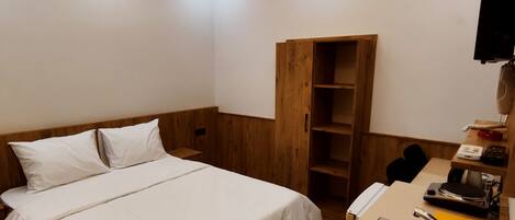 Desk, laptop workspace, free WiFi, bed sheets