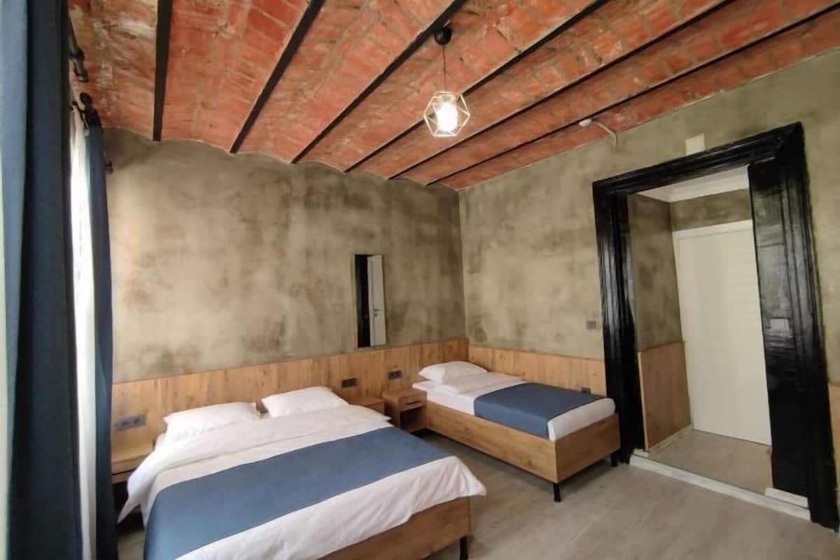 Desk, laptop workspace, free WiFi, bed sheets