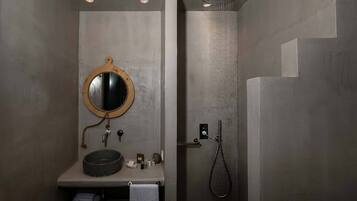 Bathtub, hair dryer, towels, soap