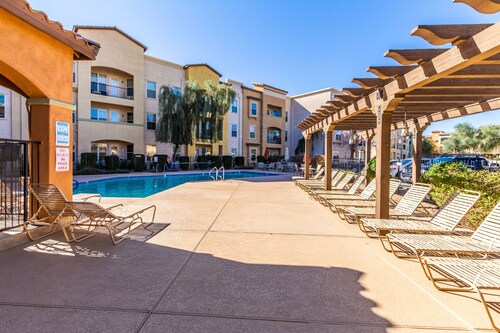 Surprise Ground Floor Condo with 2 Private Courtyards! Heated Community Pool!