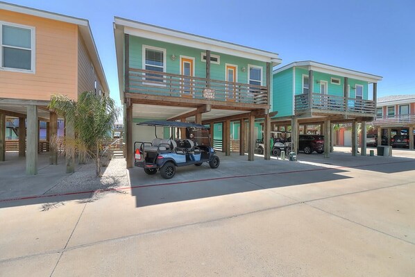 Exterior - Gorgeous home | Community pool | Outdoor gathering area (Port Aransas)
