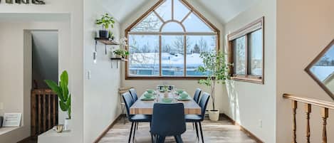Enjoy meals in this cozy dining area with a view of the surrounding landscape.