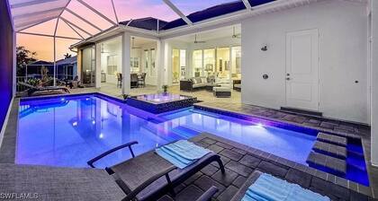 Stunning New Waterfront Luxury Villa with oversized Heated pool and Hot tub!