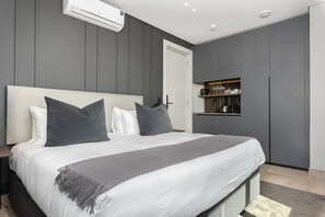 1 chambre, coffres-forts dans les chambres, fer et planche à repasser