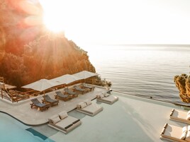 Outdoor pool, open 8:00 AM to 6:00 PM, free cabanas, pool umbrellas