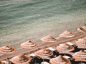 On the beach, free beach cabanas, sun loungers, beach umbrellas