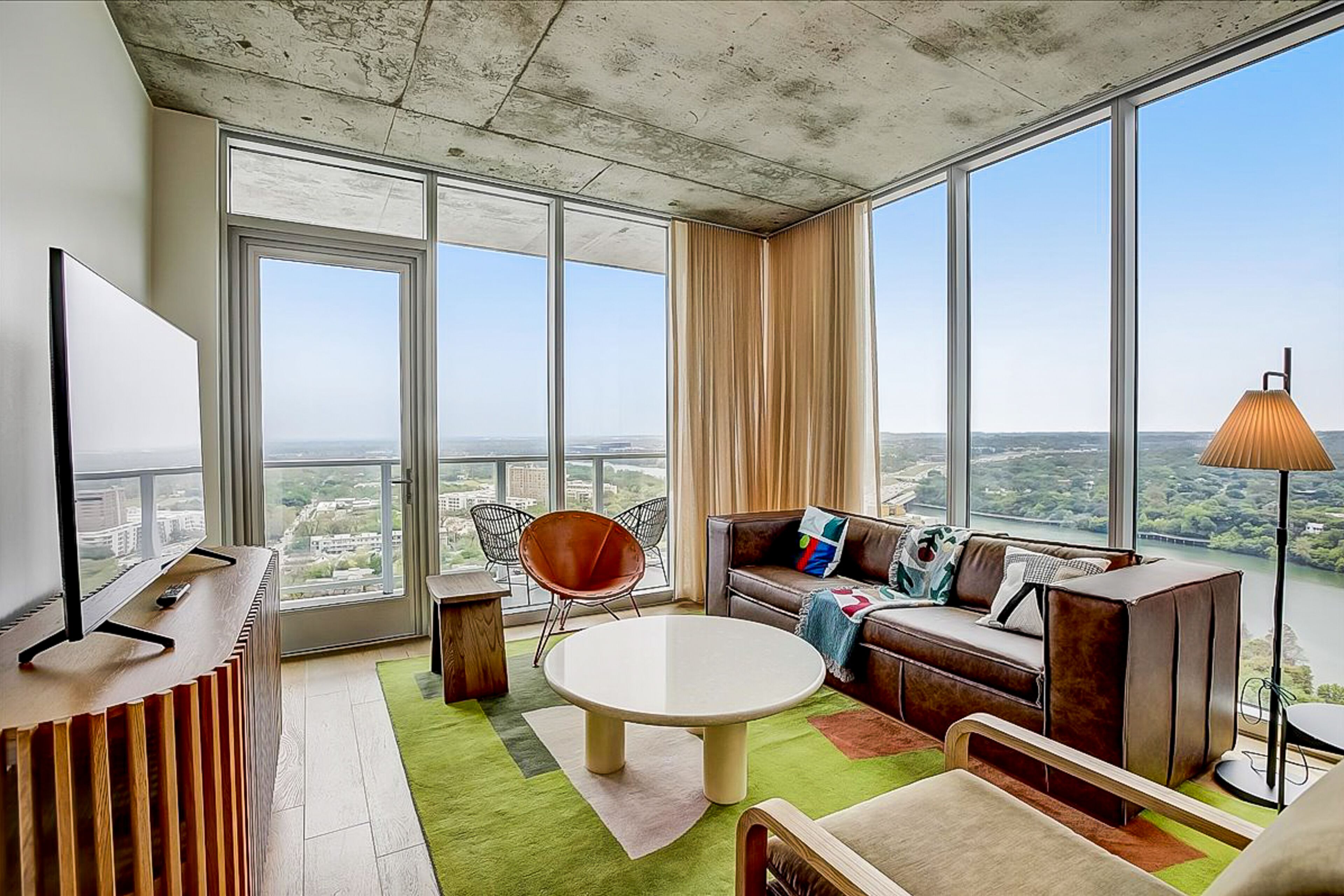 Brand-new - Rainey Street corner condo with lake-view balcony - pool & gym