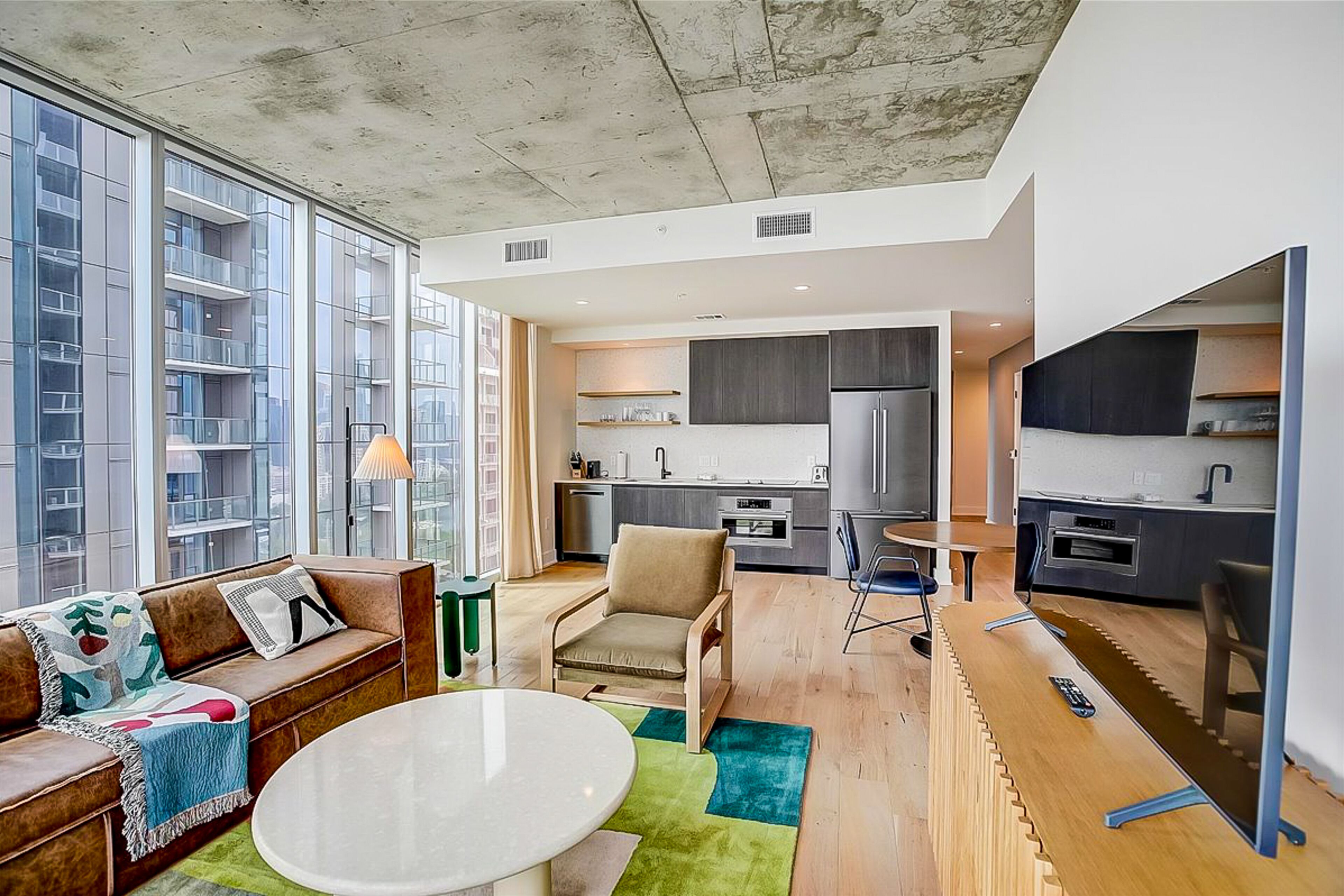 Brand-new - Rainey Street corner condo with lake-view balcony - pool & gym