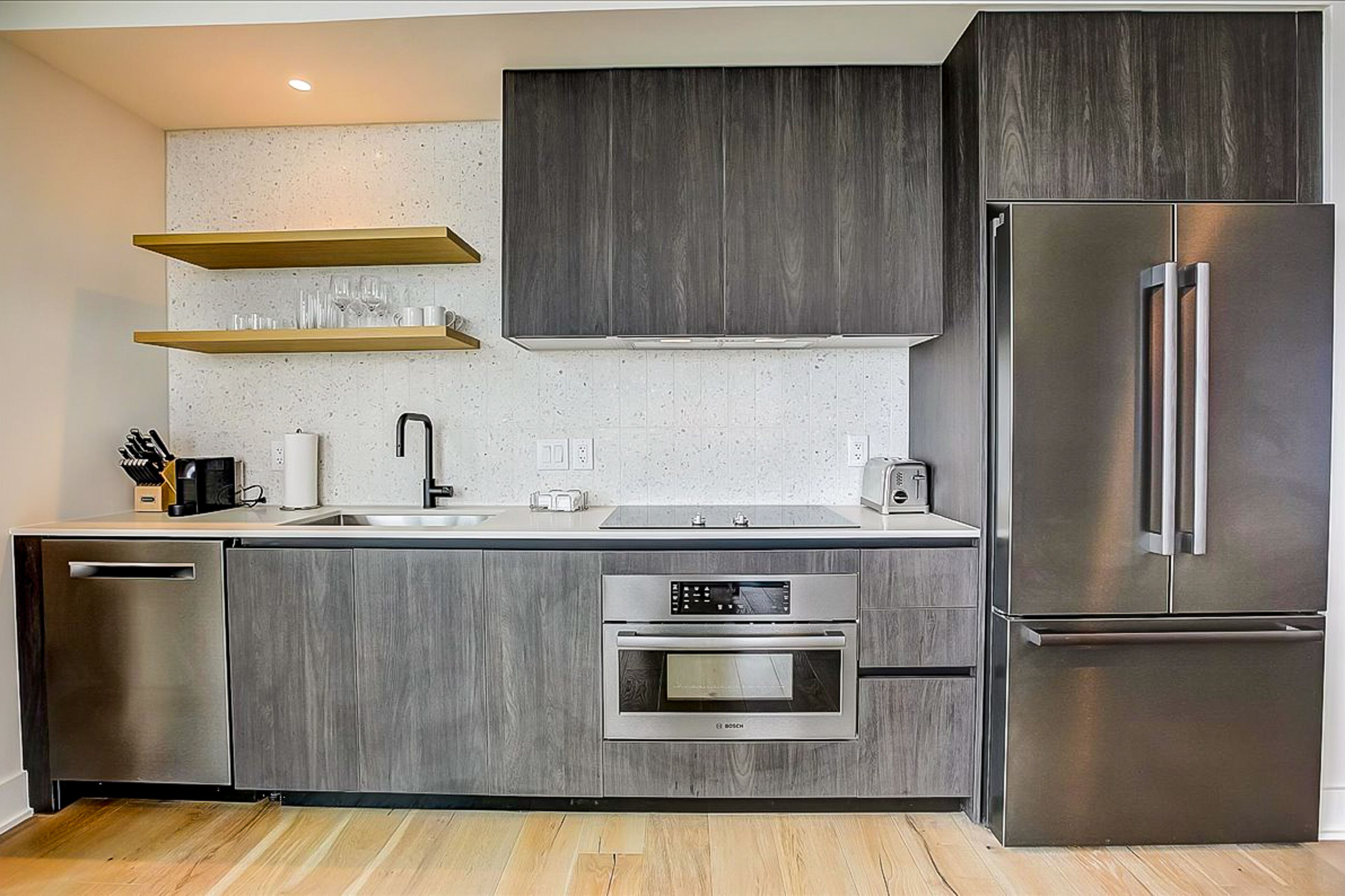 Brand-new - Rainey Street corner condo with lake-view balcony - pool & gym