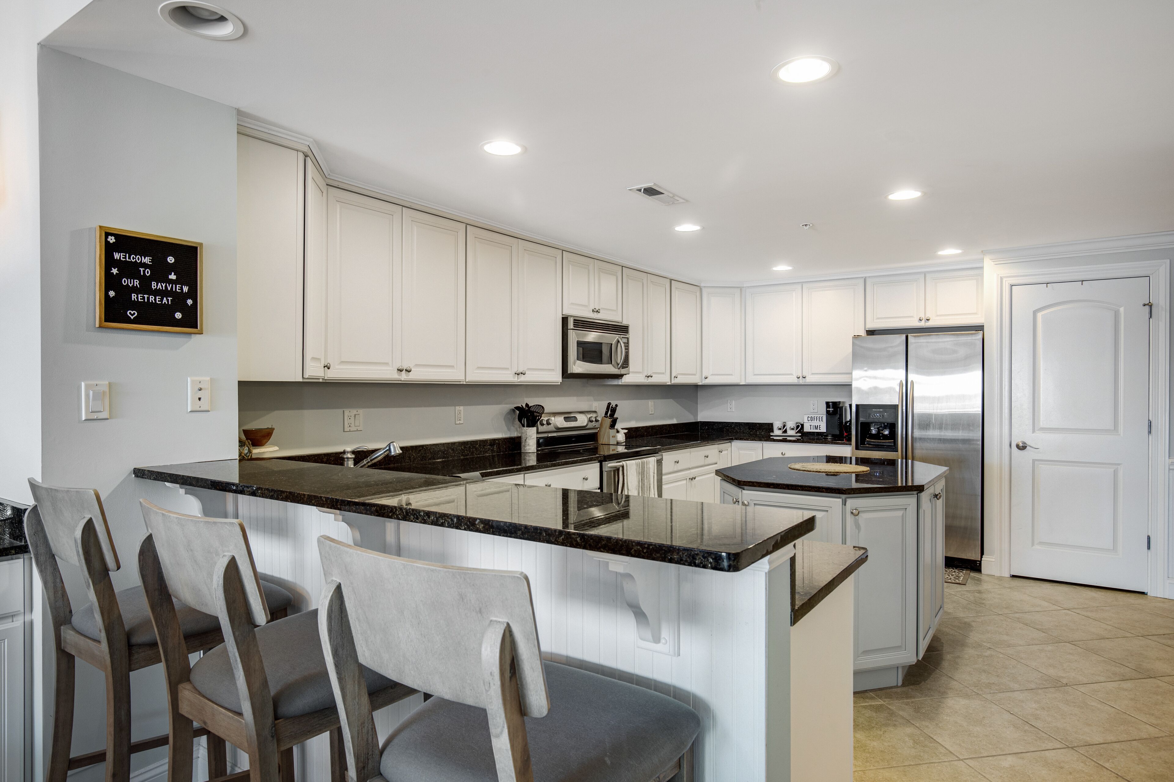 Gorgeous bay-front condo with fast WiFi, central AC, private w/d, and pool