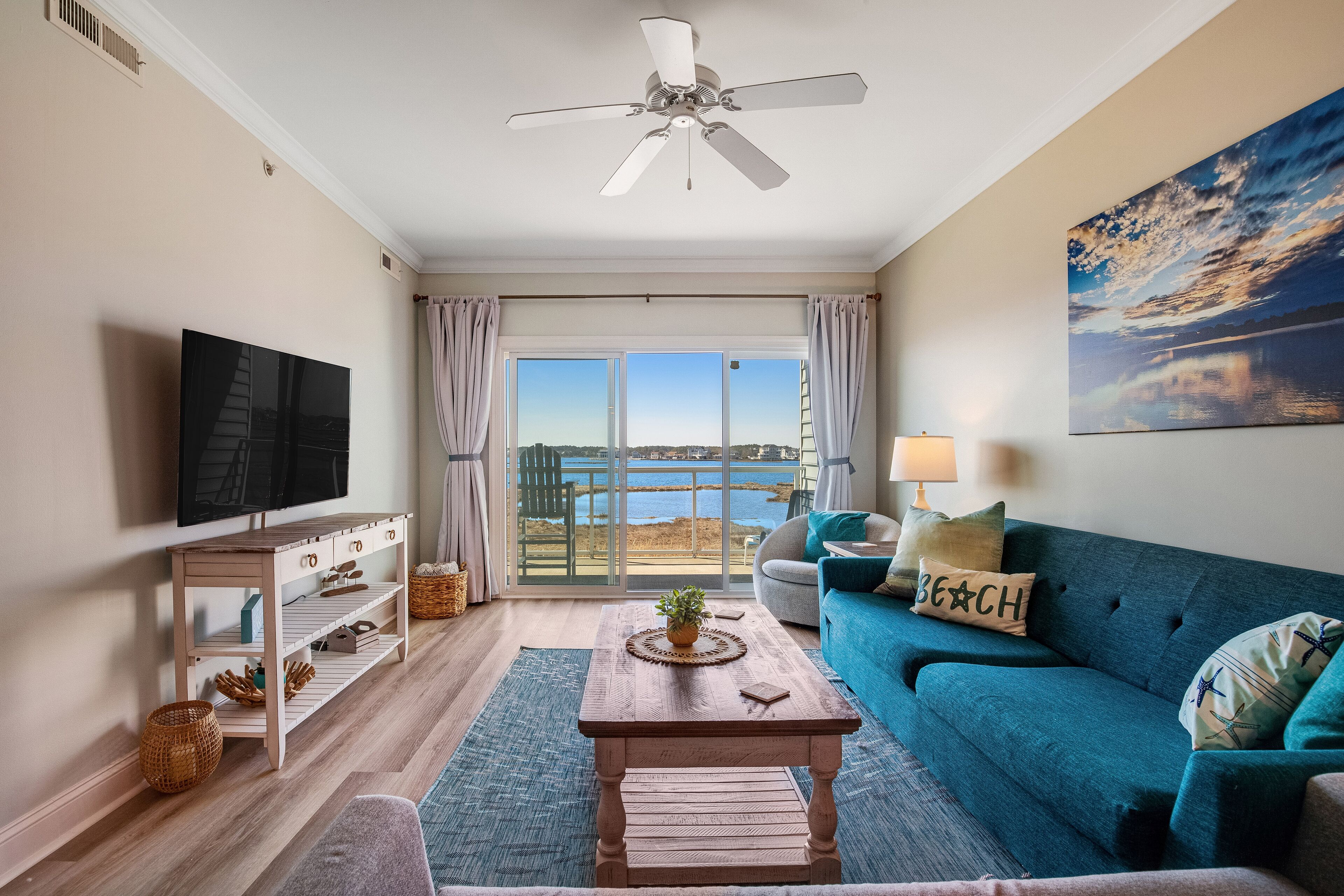 Gorgeous bay-front condo with fast WiFi, central AC, private w/d, and pool