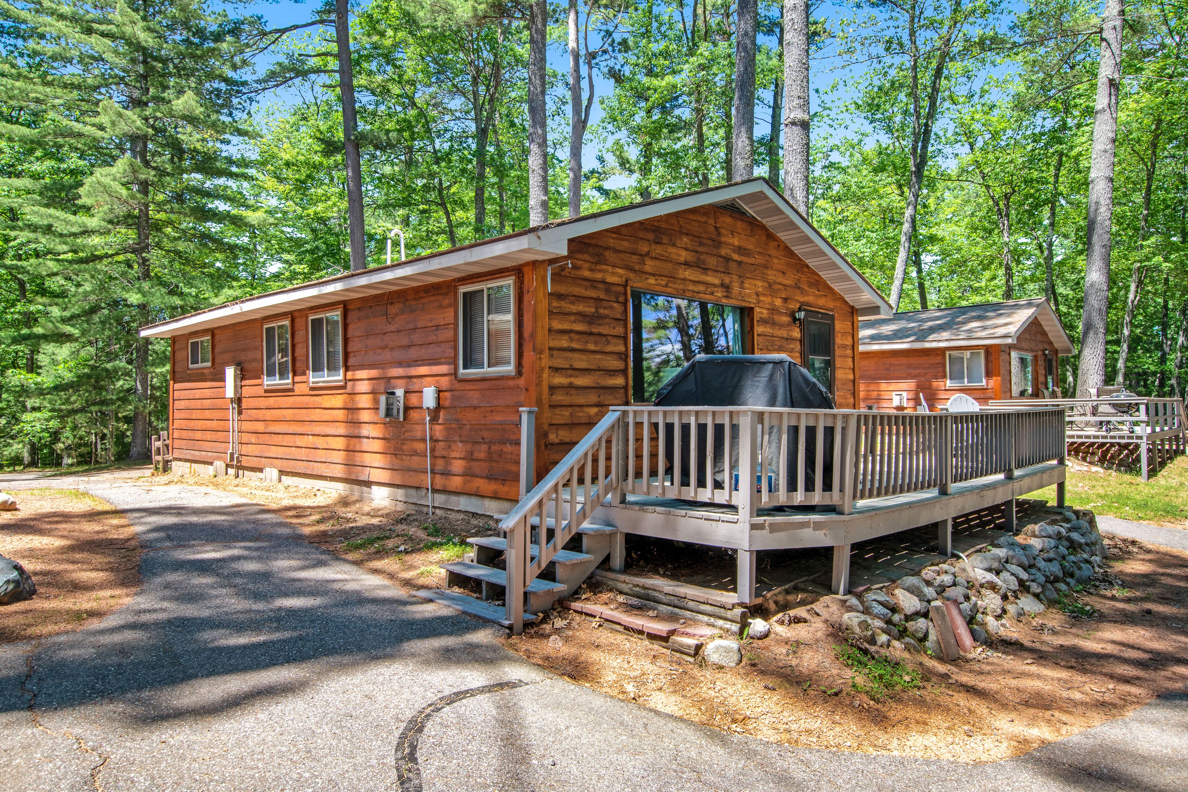 Cozy, lakefront cabin with deck, private dock & beach access