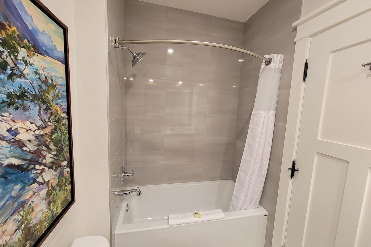 standard double room, 2 queen beds, mountain view | bathroom | hair dryer, bathrobes, towels