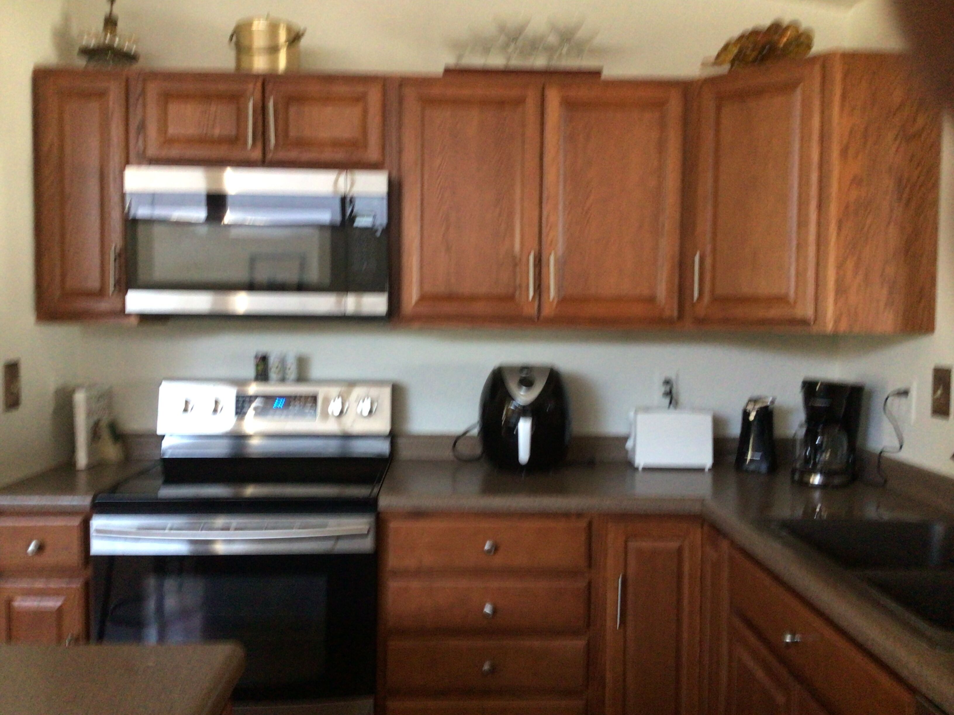 Fully furnished 3 bedroom ranch style home with large screened in porch w/garage