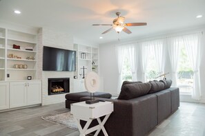 Smart TV, fireplace, video games, ping pong