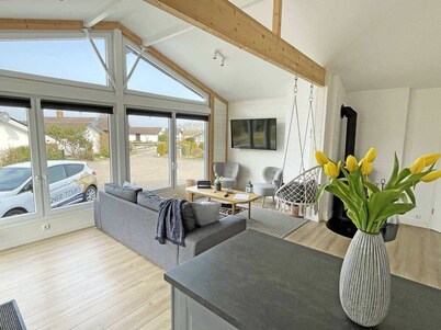 100m away from the beautiful Schlei, you will find our extensively renovated and modern bungalow "Schlei-Idyll" with maritime details, as well as a small garden area with terrace for your well-deserved time out