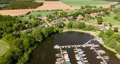 Stylish new vacation home on Lake Müritz with fireplace in a very quiet location on the outskirts of the village