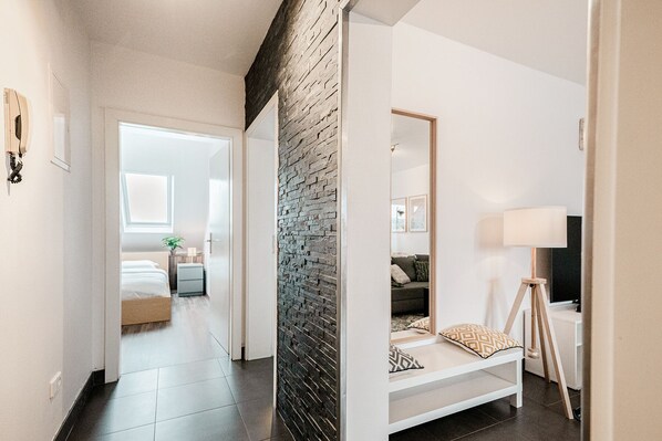 Departamento Confort, 2 habitaciones, para no fumadores | Área de sala de estar | Smart TV