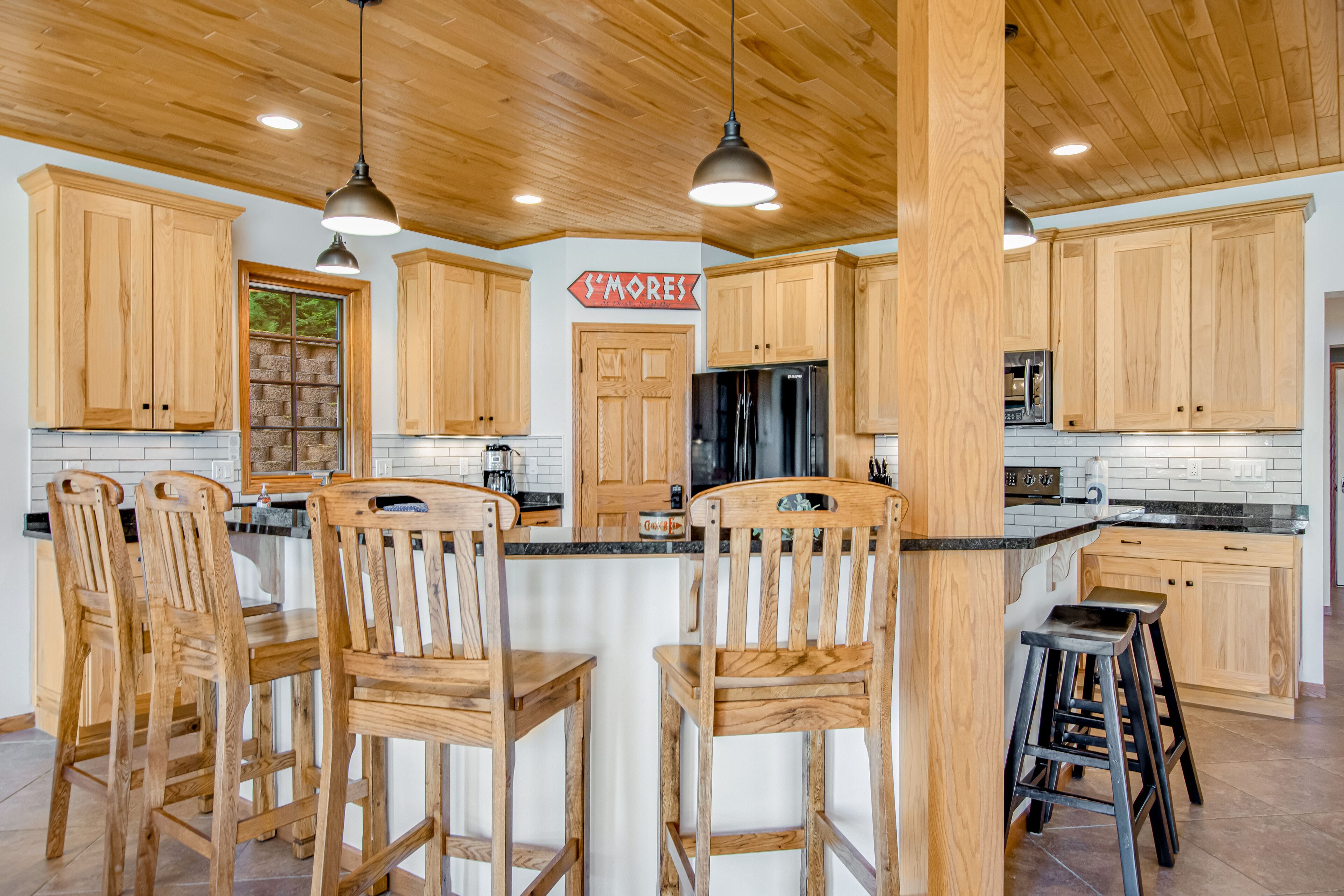 Waterfront condo with lake views, boat slip, grill, beach, AC, fireplace, & WiFi