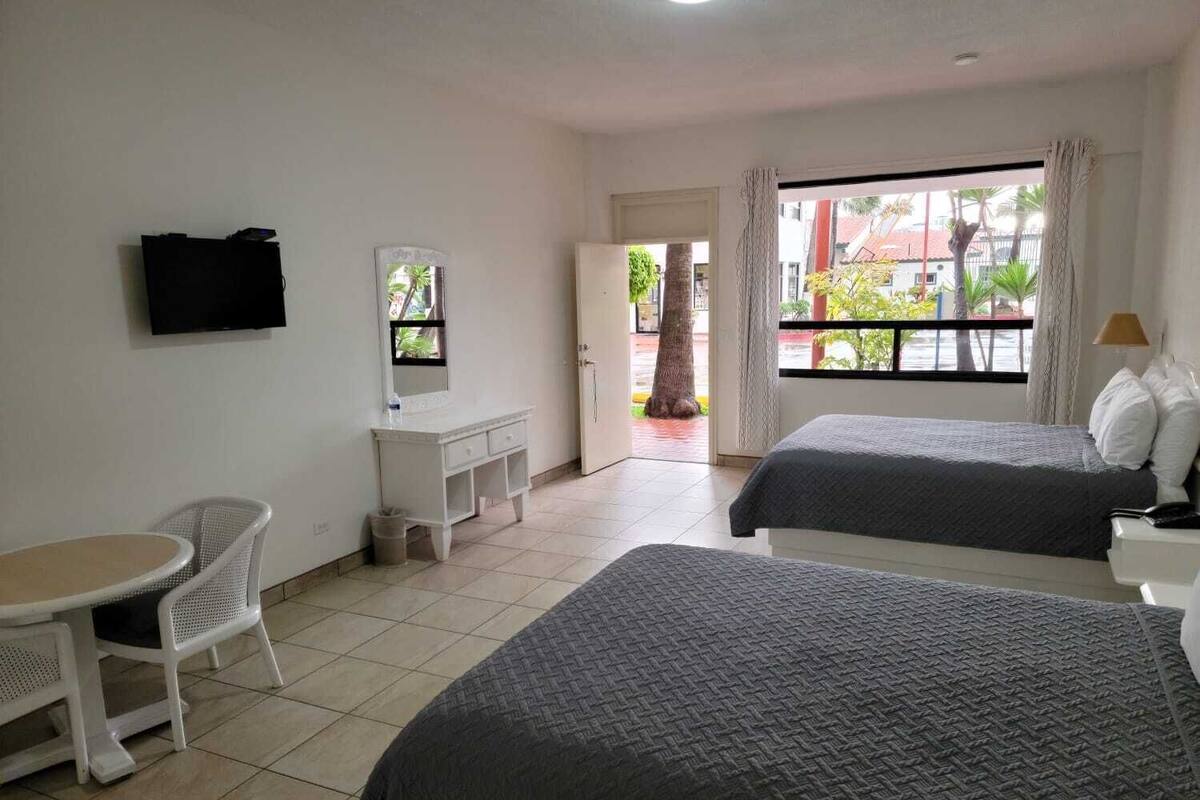Premium bedding, down comforters, desk, laptop workspace