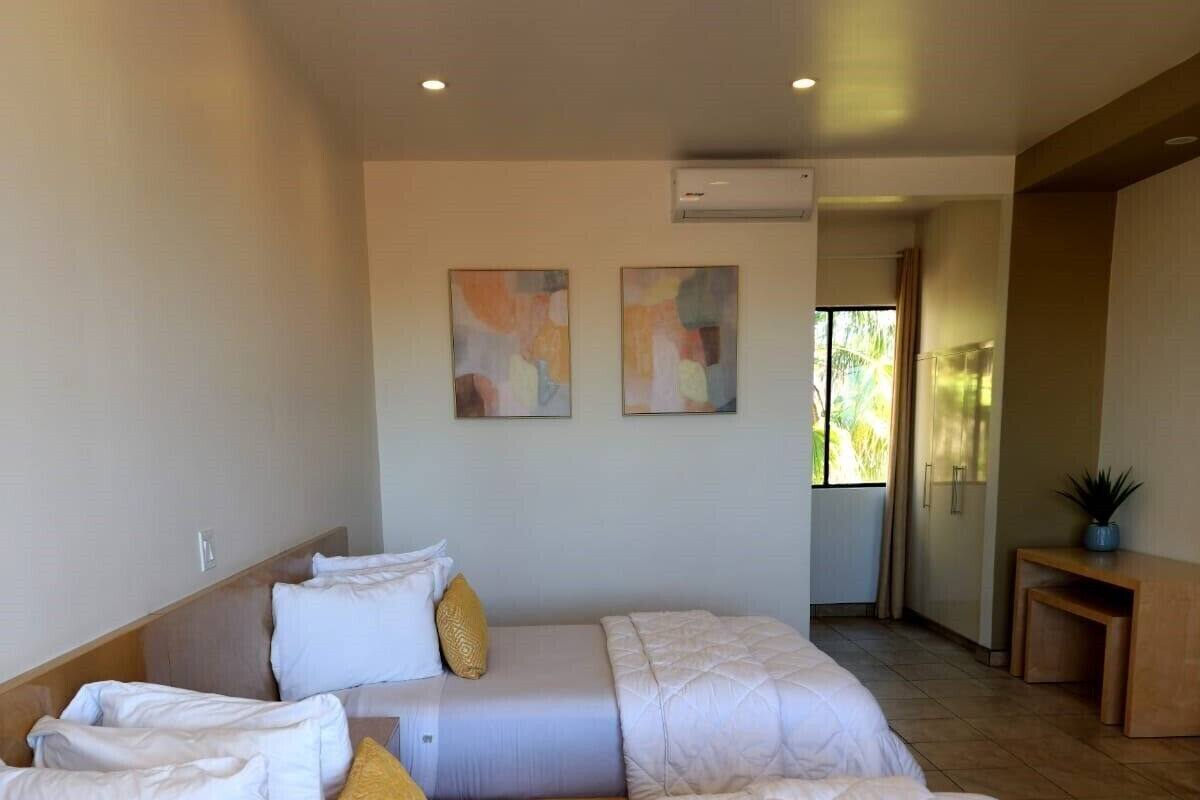 Premium bedding, down comforters, desk, laptop workspace