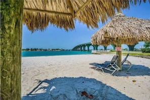 On the beach, sun loungers, beach towels