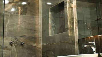 Shower, rainfall showerhead, hair dryer, towels