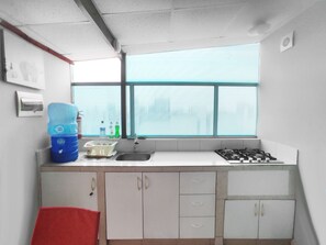 Fridge, microwave, stovetop, electric kettle