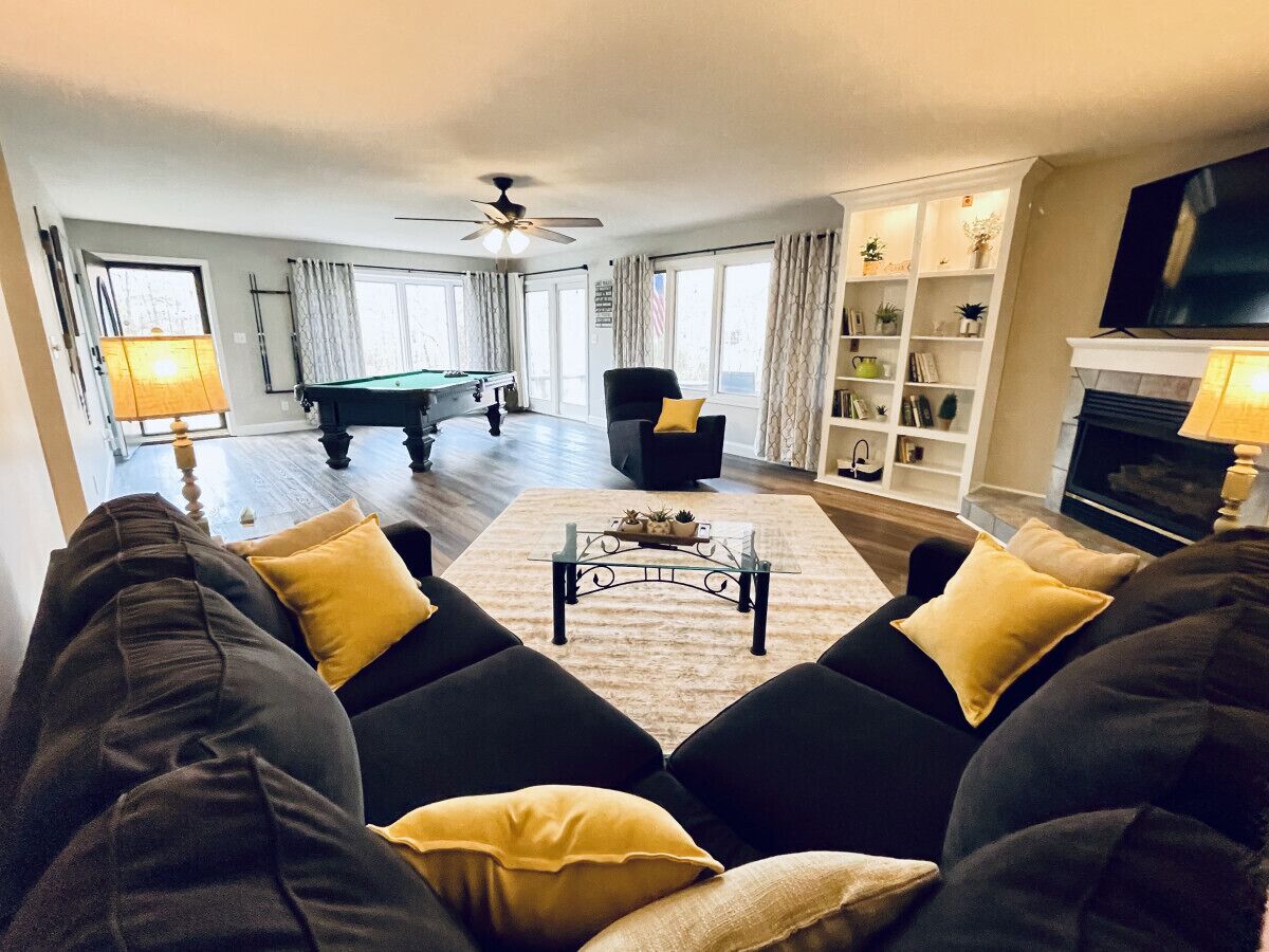 Smart TV, fireplace, books