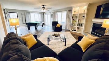 Smart TV, fireplace, books