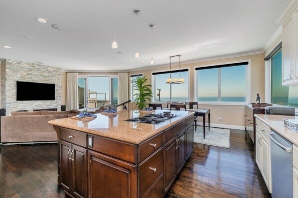 Large kitchen with island great for entertaining.  Stainless steel appliances!