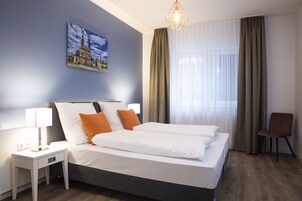 Comfort-Apartment | Schreibtisch, Reisekinderbett, kostenloses WLAN, Bettwäsche
