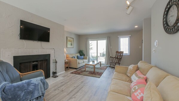 Smart TV, fireplace, foosball, books