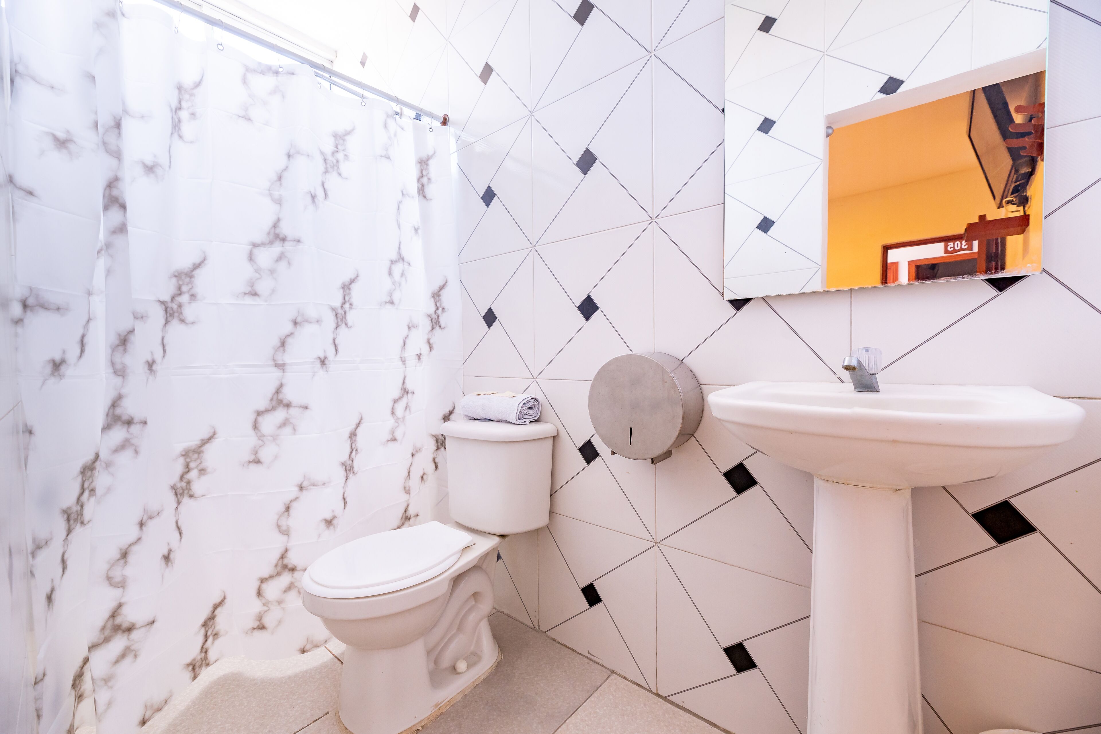 shower, designer toiletries, towels, soap