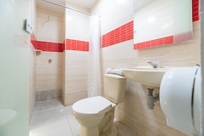 Superior Triple Room | Bathroom | Shower, designer toiletries, towels, soap