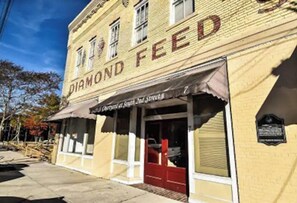 Experience the charm of this historic building, home to Diamond Feed, with its traditional facade and inviting entrance.