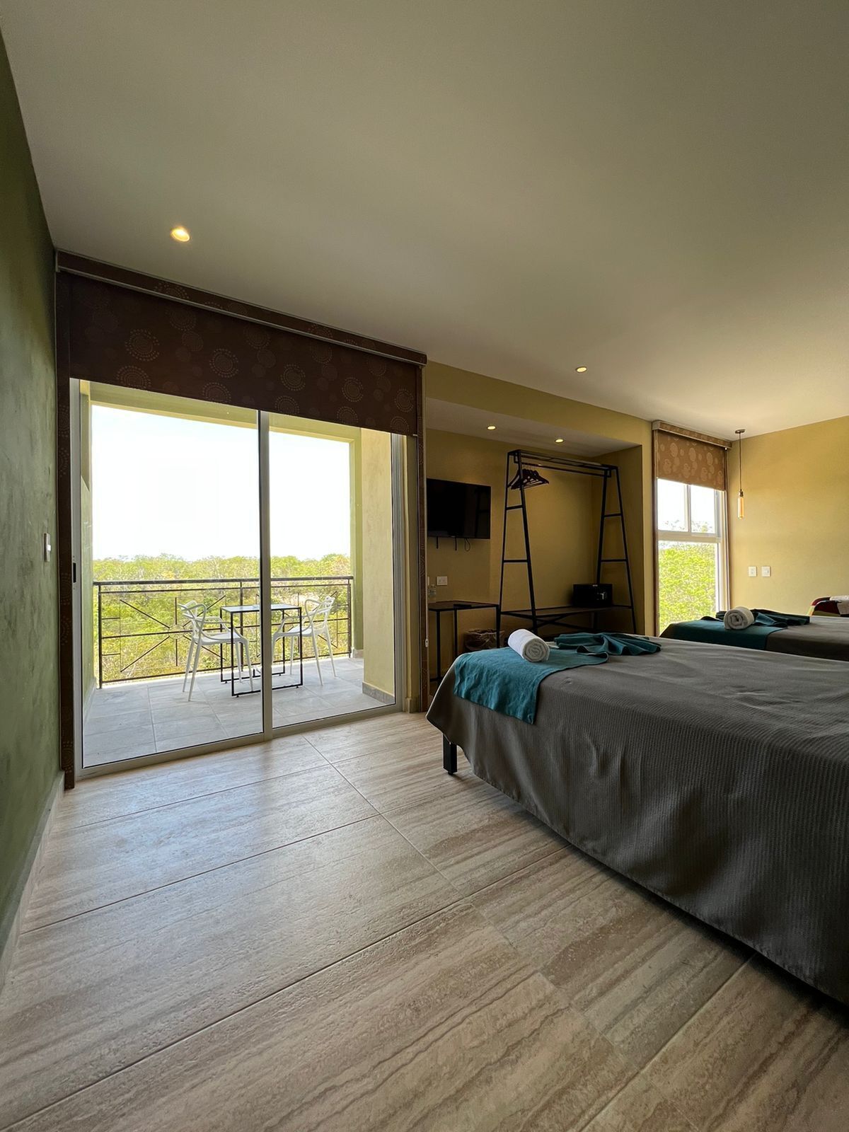 standard quadruple room | 1 bedroom, in-room safe, desk, laptop workspace