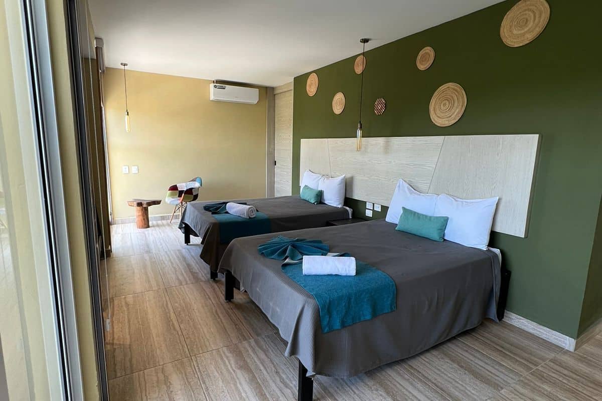 standard quadruple room | 1 bedroom, in-room safe, desk, laptop workspace