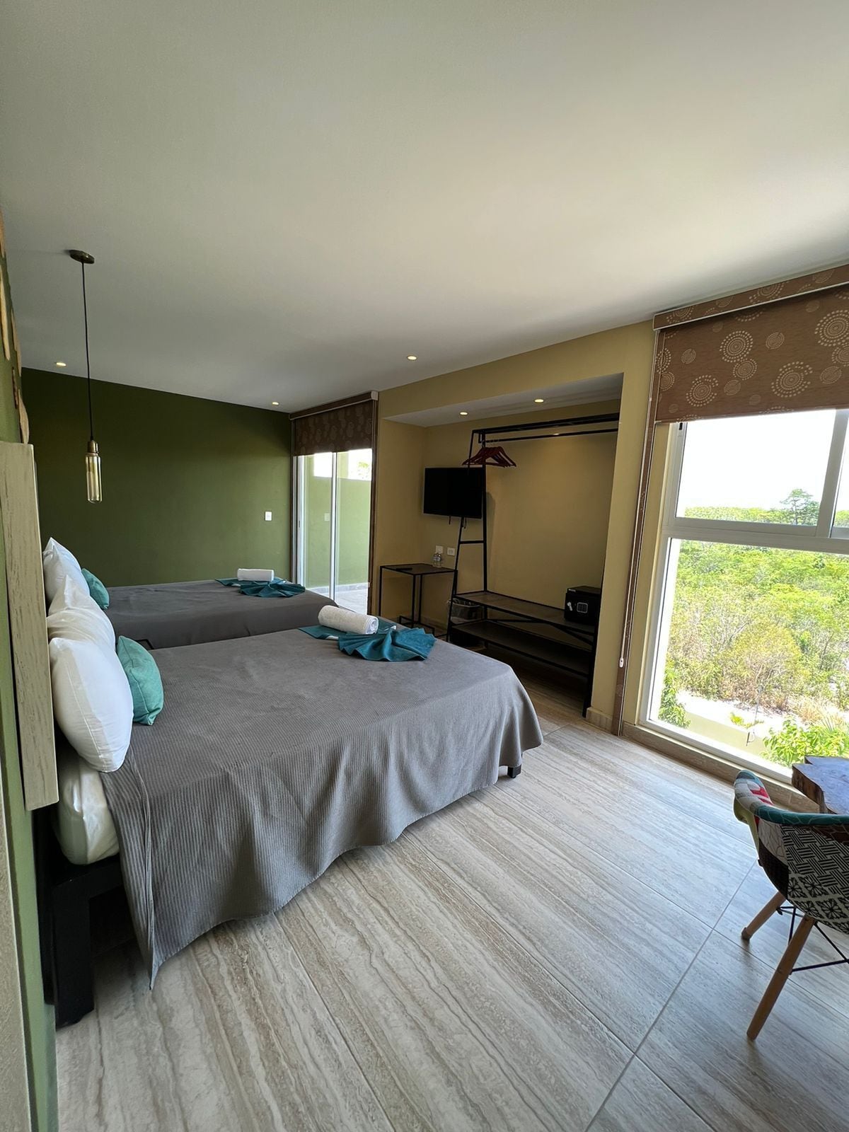 standard quadruple room | 1 bedroom, in-room safe, desk, laptop workspace