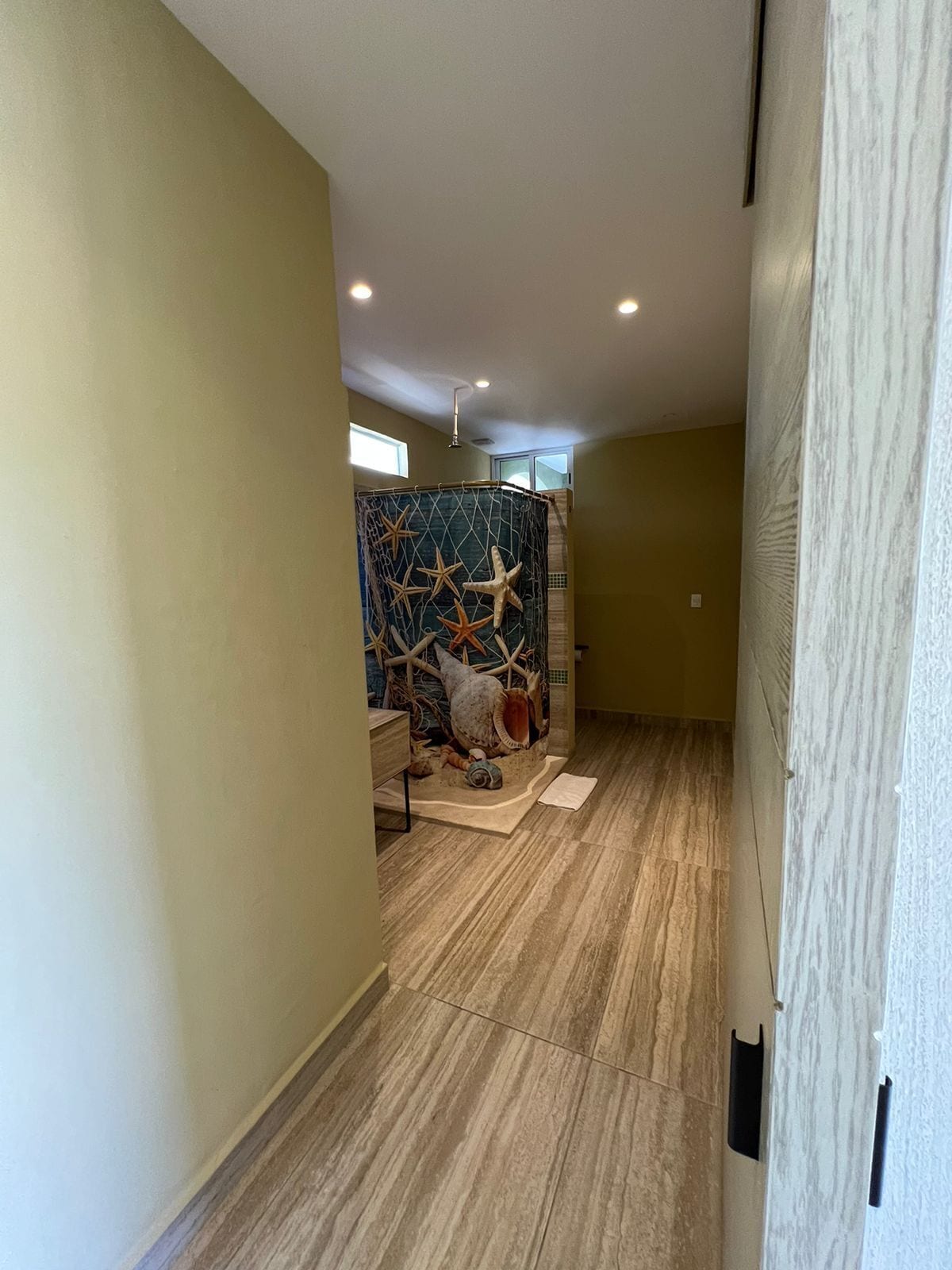 standard quadruple room | bathroom | shower, rainfall showerhead, hair dryer, towels