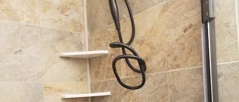 Shower, hair dryer, heated floors, towels