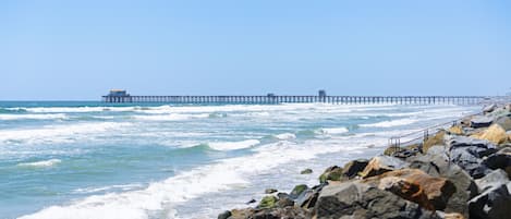 On the beach, sun-loungers, beach towels