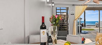 BEACHFRONT COTTAGE LOWER UNT ON THE STRAND IN OCEANSIDE, TWO-BED AND ONE-BATH