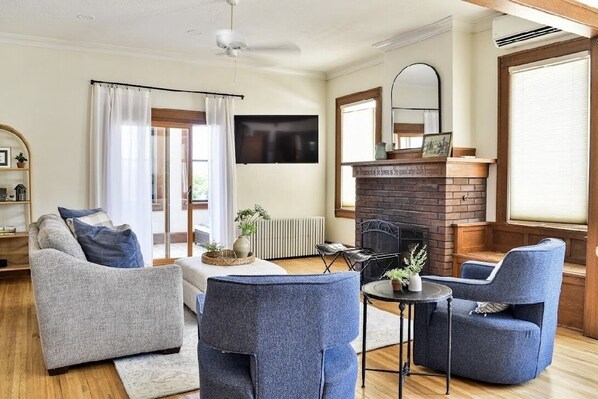 Smart TV, fireplace, books