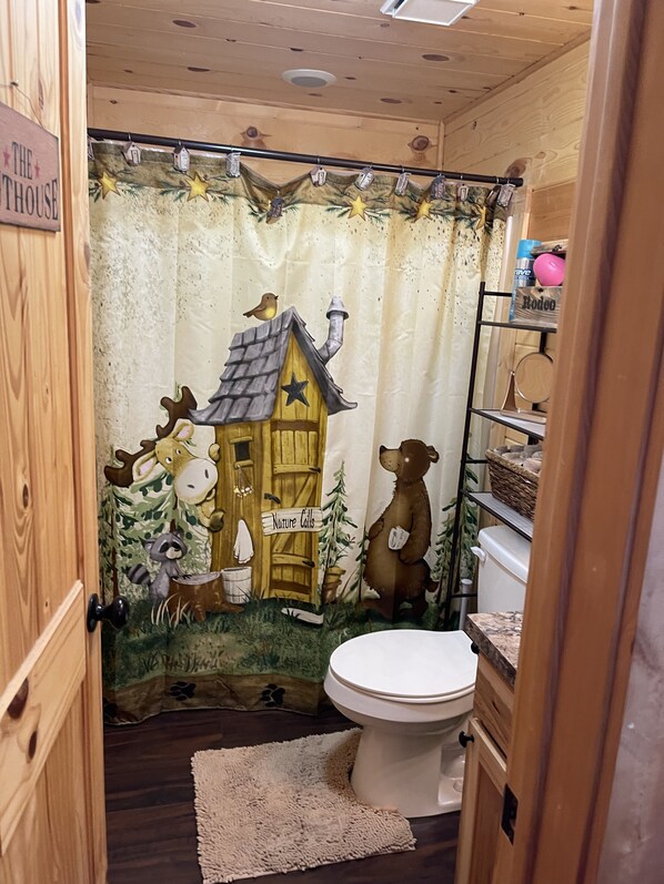 Combined shower/tub, hair dryer, towels, soap