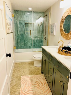 Combined shower/tub, jetted tub, hair dryer, bidet
