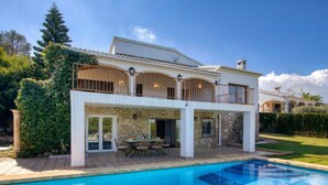 A two-story house with a swimming pool, stone exterior, and a balcony with outdoor lighting. - Villa Bellavista by Interhome (Jávea)