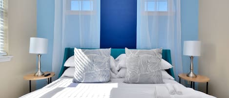 3 habitaciones, tabla de planchar con plancha, wifi y ropa de cama